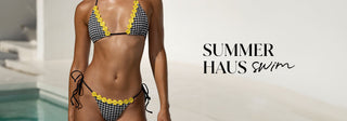 Summer Haus Swim - Model is wearing the Adrian Bralette Top in Pink Floral