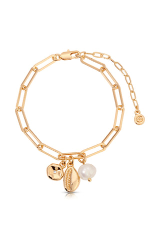 Gold bracelet with charms on a white background