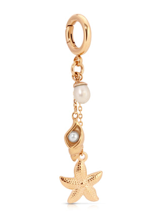 Gold charm with pearl and starfish on a white background